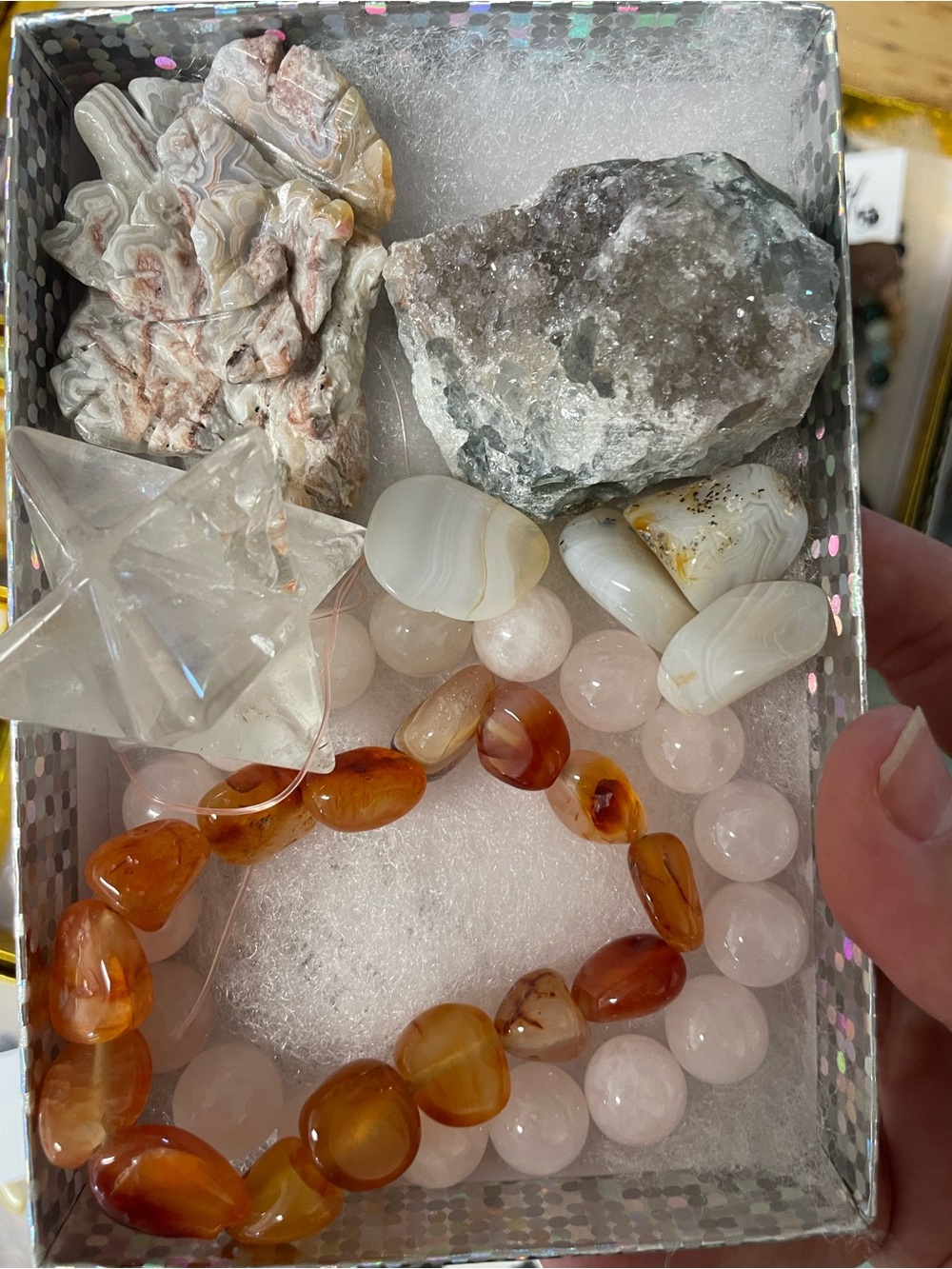 Carved and raw crystals and crystal jewelry goodie box